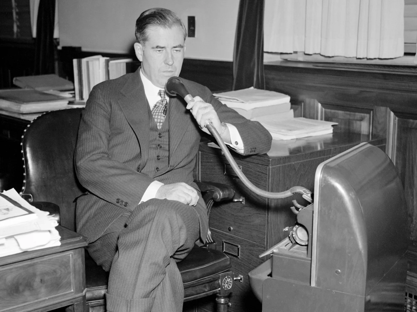 Henry A. Wallace, Secretary of Agriculture, dictating speeches into a Dictaphone, Washington D.C., September 1937