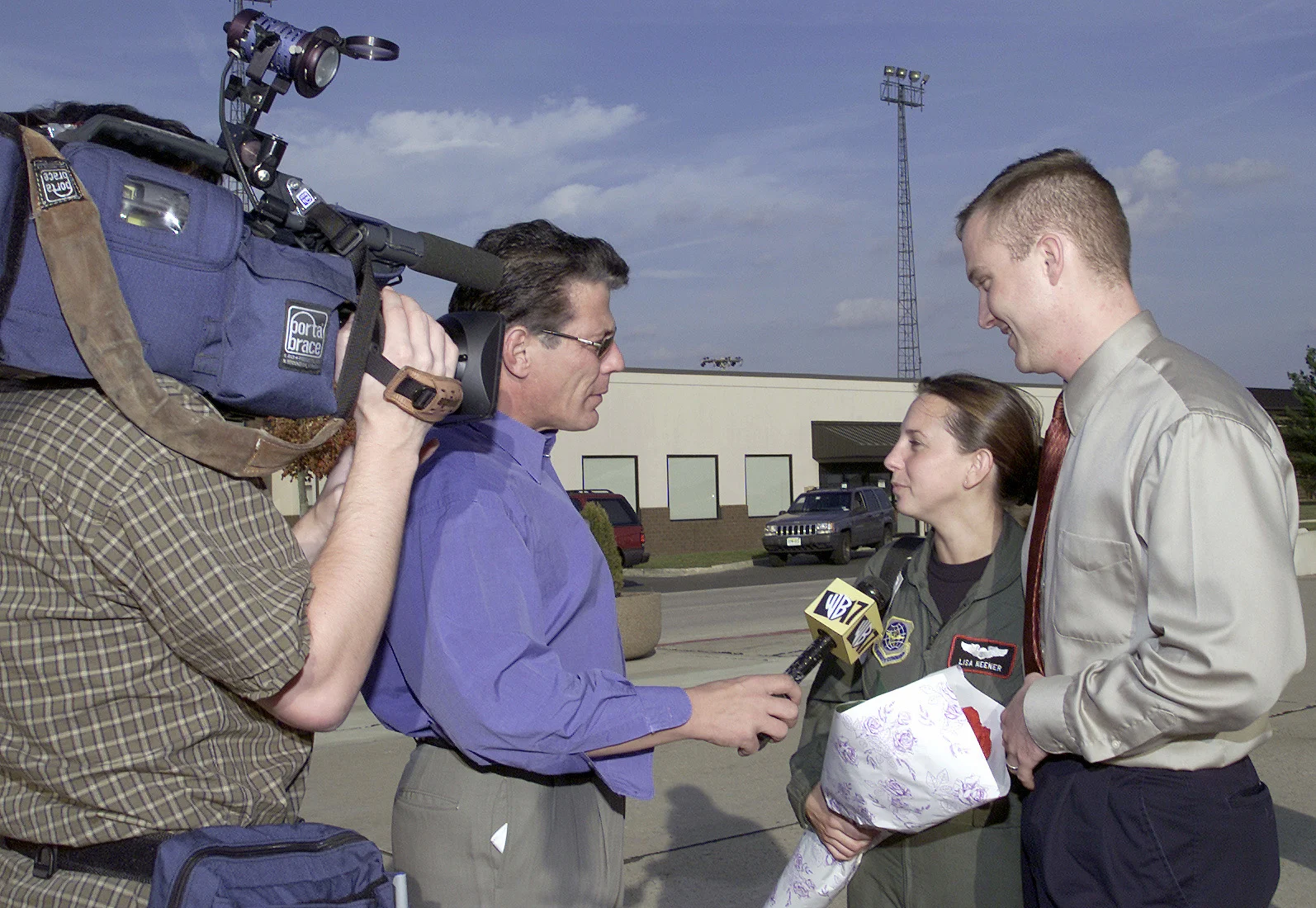 A WB17 television reporter interviews a pilot at McGuire Air Force Base, New Jersey, returning from deployment in support of Operation Enduring Freedom, November 2, 2001